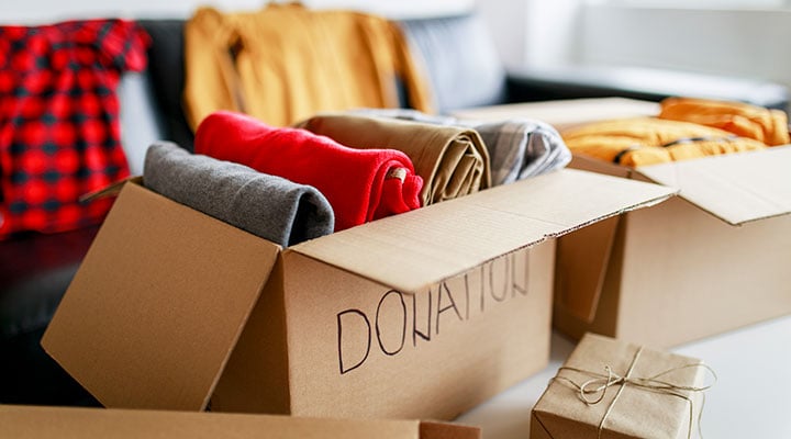 excess clothing in donation boxes